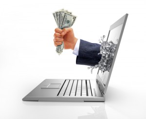 hands-crashing-through-laptop-computer-screen-to-grab-us-dollar-money-notes-o